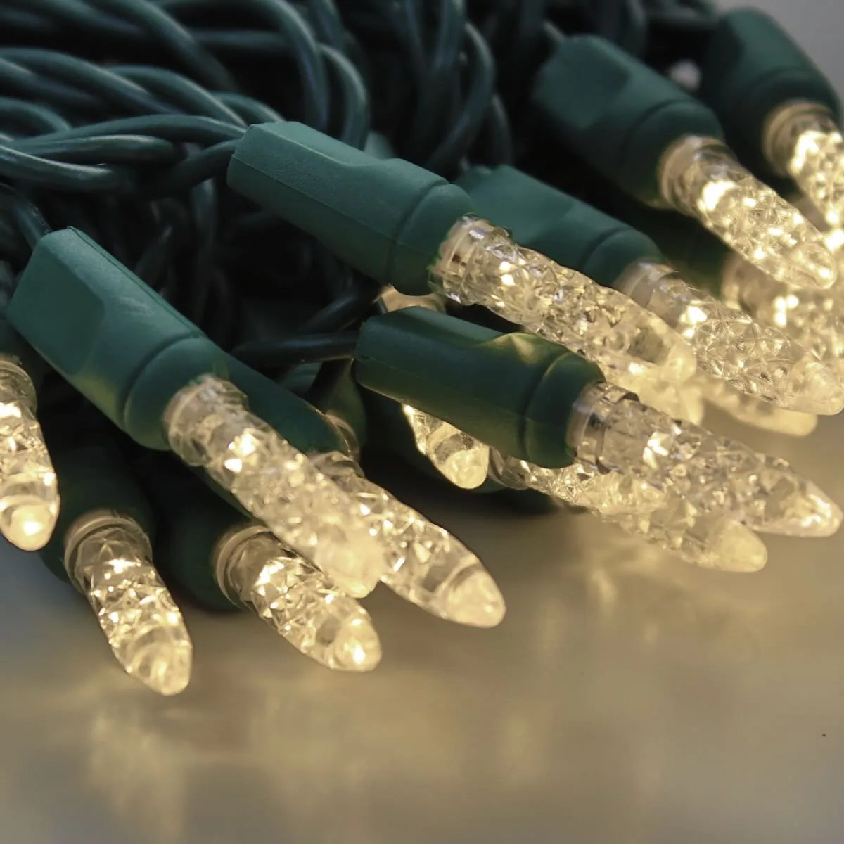 50-light  M5 Warm White LED Christmas Lights, 4" Spacing Green Wire